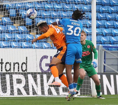 011125 - Peterborough United v Cardiff City - FA Cup First Round - Callum Robinson of Cardiff tries a header to goal but is thwarted by Peter Kioso of Peterborough