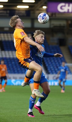 011125 - Peterborough United v Cardiff City - FA Cup First Round - Isaak Davies of Cardiff and Harley Mills of Peterborough