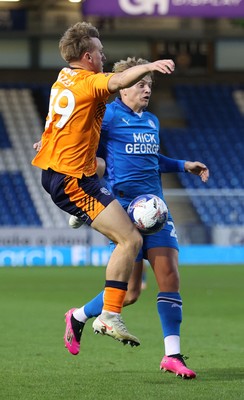 011125 - Peterborough United v Cardiff City - FA Cup First Round - Isaak Davies of Cardiff and Harley Mills of Peterborough