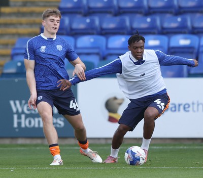 011125 - Peterborough United v Cardiff City - FA Cup First Round - Warm up…Dylan Lawlor of Cardiff and Ronan Kpakio of Cardiff
