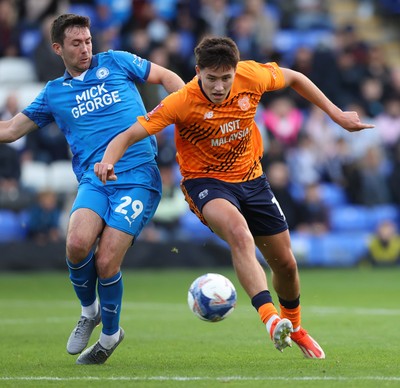 011125 - Peterborough United v Cardiff City - FA Cup First Round - Rubin Colwill of Cardiff and Tom O’Connor of Peterborough