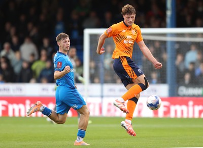 011125 - Peterborough United v Cardiff City - FA Cup First Round - Will Fish of Cardiff and Harry Leonard of Peterborough