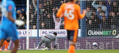 011125 - Peterborough United v Cardiff City - FA Cup First Round - Goalkeeper Nathan Trott of Cardiff is floored whilst home crowd celebrate the goal scored by Harry Leonard of Peterborough