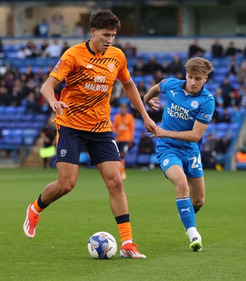 011125 - Peterborough United v Cardiff City - FA Cup First Round - Rubin Colwill of Cardiff and Jimmy-Jay Morgan of Peterborough