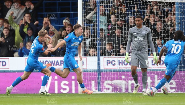 011125 - Peterborough United v Cardiff City - FA Cup First Round - Harry Leonard of Peterborough celebrates scoring 1st goal of the match with Goalkeeper Nathan Trott of Cardiff in goal