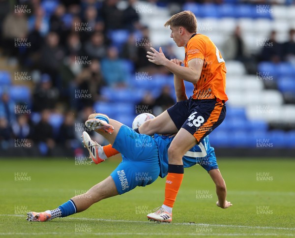 011125 - Peterborough United v Cardiff City - FA Cup First Round - Dylan Lawlor of Cardiff and Harry Leonard of Peterborough