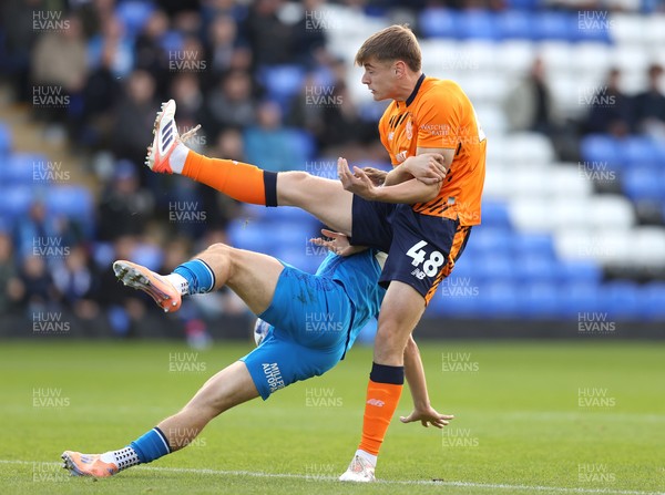011125 - Peterborough United v Cardiff City - FA Cup First Round - Dylan Lawlor of Cardiff and Harry Leonard of Peterborough