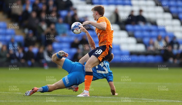 011125 - Peterborough United v Cardiff City - FA Cup First Round - Dylan Lawlor of Cardiff and Harry Leonard of Peterborough