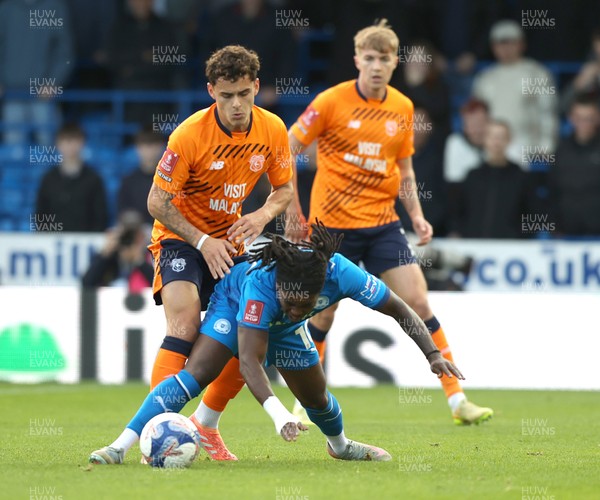 011125 - Peterborough United v Cardiff City - FA Cup First Round - Alex Robertson of Cardiff and Abraham Odoh of Peterborough 