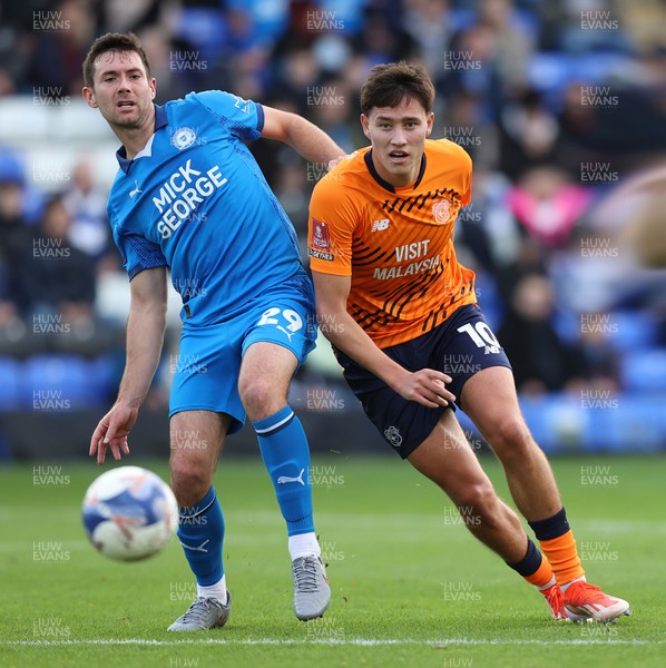 011125 - Peterborough United v Cardiff City - FA Cup First Round - Rubin Colwill of Cardiff and Tom O’Connor of Peterborough
