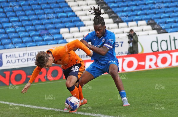 011125 - Peterborough United v Cardiff City - FA Cup First Round - Cian Ashford of Cardiff and Peter Kioso of Peterborough