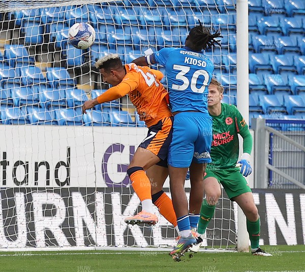 011125 - Peterborough United v Cardiff City - FA Cup First Round - Callum Robinson of Cardiff tries a header to goal but is thwarted by Peter Kioso of Peterborough