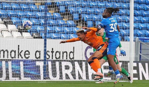 011125 - Peterborough United v Cardiff City - FA Cup First Round - Callum Robinson of Cardiff tries a header to goal but is thwarted by Peter Kioso of Peterborough