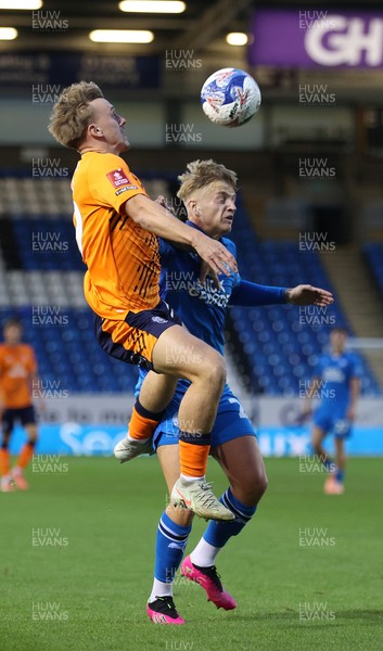 011125 - Peterborough United v Cardiff City - FA Cup First Round - Isaak Davies of Cardiff and Harley Mills of Peterborough