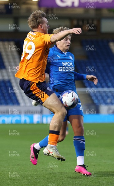 011125 - Peterborough United v Cardiff City - FA Cup First Round - Isaak Davies of Cardiff and Harley Mills of Peterborough