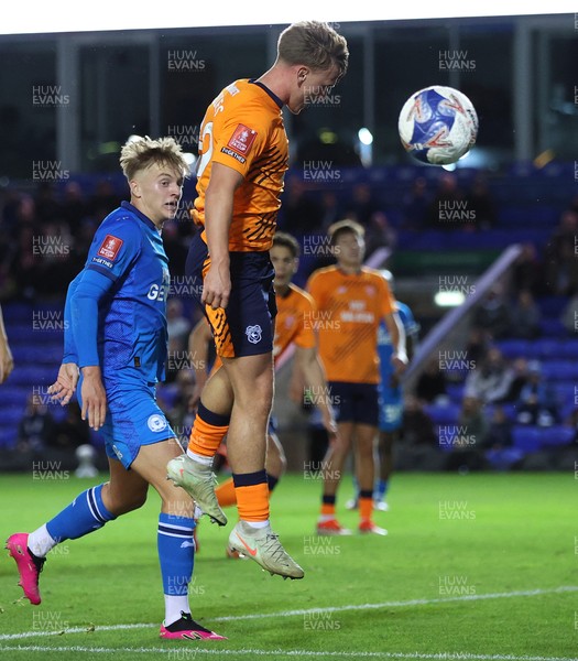011125 - Peterborough United v Cardiff City - FA Cup First Round - Isaak Davies of Cardiff and Harley Mills of Peterborough