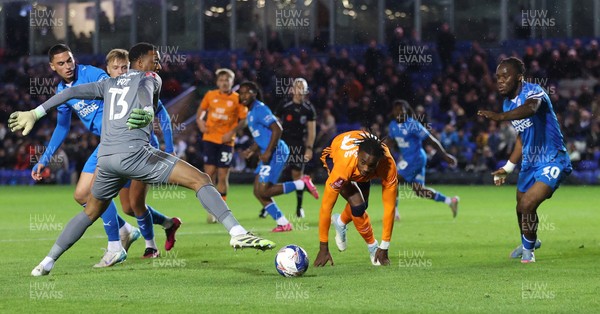 011125 - Peterborough United v Cardiff City - FA Cup First Round - Tanaswa Nyakuhwa of Cardiff and Goalkeeper Nathan Trott of Cardiff try for a goal in stoppage time at the end of the match