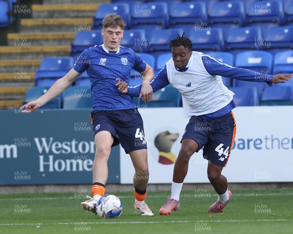 011125 - Peterborough United v Cardiff City - FA Cup First Round - Warm up…Dylan Lawlor of Cardiff and Ronan Kpakio of Cardiff