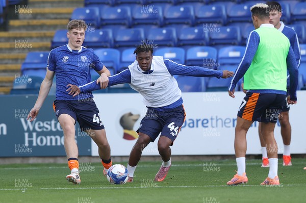 011125 - Peterborough United v Cardiff City - FA Cup First Round - Warm up…Dylan Lawlor of Cardiff and Ronan Kpakio of Cardiff