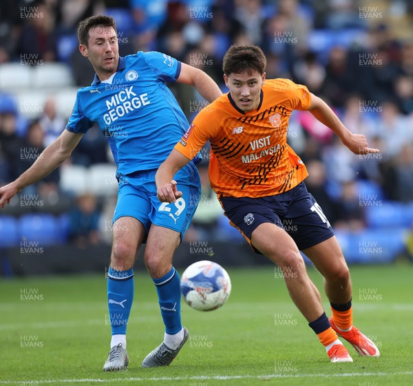 011125 - Peterborough United v Cardiff City - FA Cup First Round - Rubin Colwill of Cardiff and Tom O’Connor of Peterborough