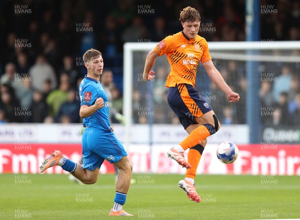 011125 - Peterborough United v Cardiff City - FA Cup First Round - Will Fish of Cardiff and Harry Leonard of Peterborough