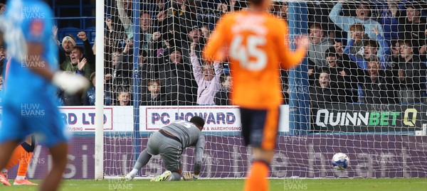 011125 - Peterborough United v Cardiff City - FA Cup First Round - Goalkeeper Nathan Trott of Cardiff is floored whilst home crowd celebrate the goal scored by Harry Leonard of Peterborough