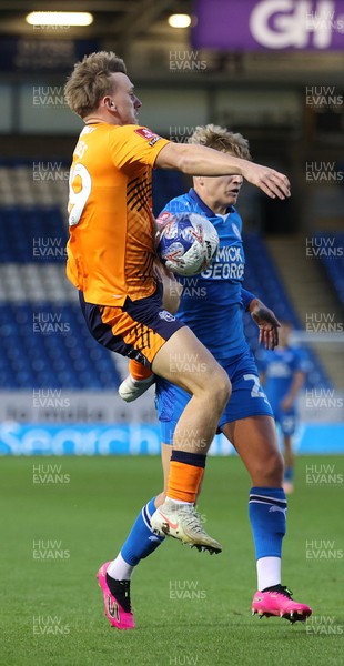 011125 - Peterborough United v Cardiff City - FA Cup First Round - Isaak Davies of Cardiff and Harley Mills of Peterborough