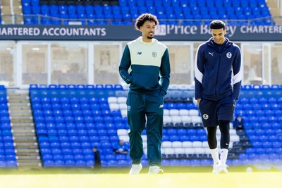 060426 - Peterborough United v Cardiff City - Sky Bet League 1 - Calum Scanlon of Cardiff City with Peterborough United’s Brandon Khela