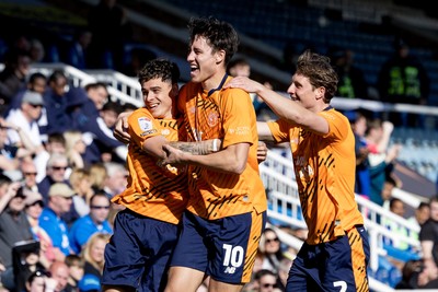 060426 - Peterborough United v Cardiff City - Sky Bet League 1 - Alex Robertson of Cardiff City celebrates scoring his sides goal with Rubin Colwill of Cardiff City and William Fish of Cardiff City