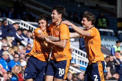 060426 - Peterborough United v Cardiff City - Sky Bet League 1 - Alex Robertson of Cardiff City celebrates scoring his sides goal with Rubin Colwill of Cardiff City and William Fish of Cardiff City