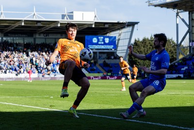 060426 - Peterborough United v Cardiff City - Sky Bet League 1 - Rubin Colwill of Cardiff City and Cian Hayes of Peterborough United