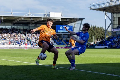 060426 - Peterborough United v Cardiff City - Sky Bet League 1 - Rubin Colwill of Cardiff City and Cian Hayes of Peterborough United