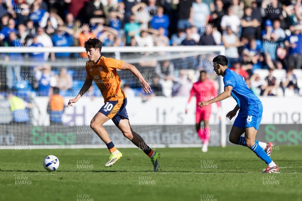 060426 - Peterborough United v Cardiff City - Sky Bet League 1 - Rubin Colwill of Cardiff City wins the ball Brandon Khela of Peterborough United