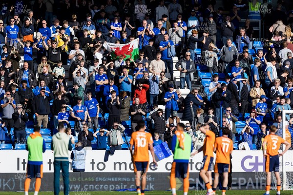 060426 - Peterborough United v Cardiff City - Sky Bet League 1 - Cardiff City fans applaud the players after the match