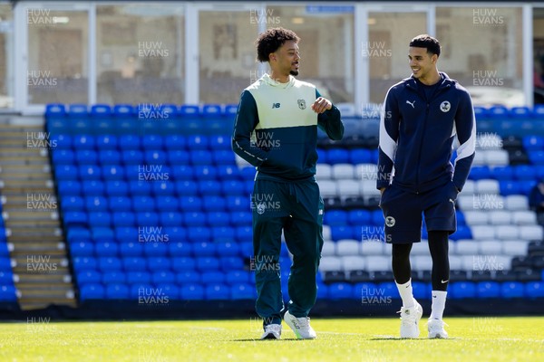 060426 - Peterborough United v Cardiff City - Sky Bet League 1 - Calum Scanlon of Cardiff City with Peterborough United’s Brandon Khela