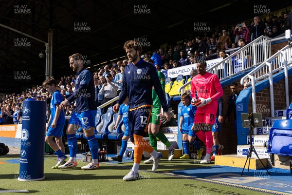 060426 - Peterborough United v Cardiff City - Sky Bet League 1 - Calum Chambers of Cardiff City and Nathan Trott of Cardiff City arrive onto the field