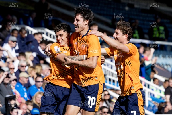 060426 - Peterborough United v Cardiff City - Sky Bet League 1 - Alex Robertson of Cardiff City celebrates scoring his sides goal with Rubin Colwill of Cardiff City and William Fish of Cardiff City