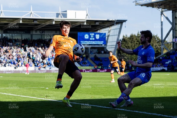 060426 - Peterborough United v Cardiff City - Sky Bet League 1 - Rubin Colwill of Cardiff City and Cian Hayes of Peterborough United