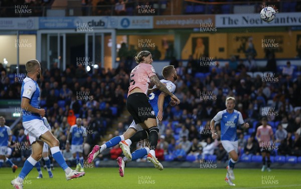 170821 - Peterborough v Cardiff City - Sky Bet Championship - Aden Flint of Cardiff tries a header on goal