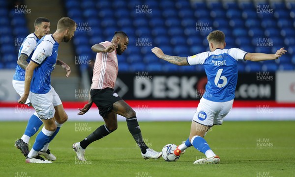 170821 - Peterborough v Cardiff City - Sky Bet Championship - Leandra Bacuna of Cardiff tries to pass Frankie Kent of Peterborough