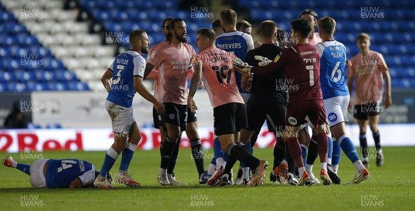 170821 - Peterborough v Cardiff City - Sky Bet Championship - Handbags from both side as Nathan Thompson of Peterborough lies injured