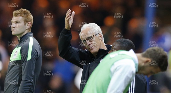 170821 - Peterborough v Cardiff City - Sky Bet Championship - Manager Mick McCarthy of Cardiff gestures to subs