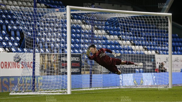 170821 - Peterborough v Cardiff City - Sky Bet Championship - Goalkeeper Christy Pym of Peterborough can’t stop the Cardiff 1st goal from Aden Flint of Cardiff hitting the back of the net
