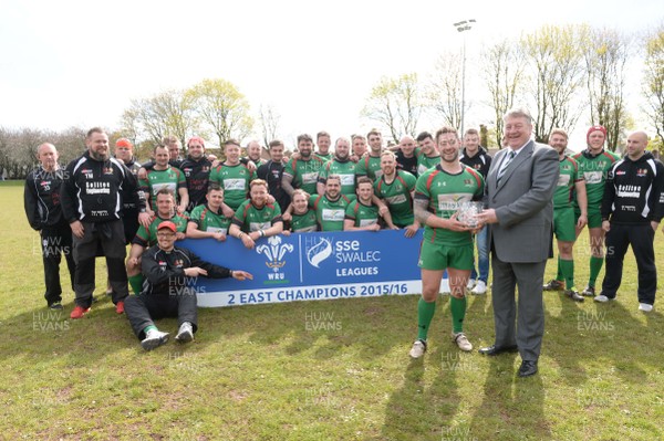 300416 - Pill Harriers v Abertillery Blaenau Gwent - SWALEC League 2 East -Abertillery Blaenau Gwent captain Luke Pegler is presented with the winners trophy by Abertillery Blaenau Gwent Chairman Roger Clark