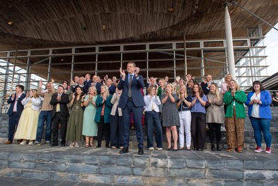 090526 - Picture shows Plaid Cymru leader Rhun Ap Lorwerth and Plaid Cymru’s 43 newly elected Senedd members at the Senedd in Cardiff to mark history in Wales as a new government is elected