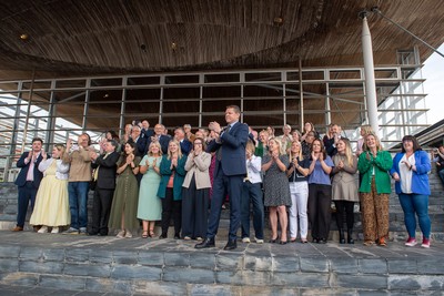 090526 - Picture shows Plaid Cymru leader Rhun Ap Lorwerth and Plaid Cymru’s 43 newly elected Senedd members at the Senedd in Cardiff to mark history in Wales as a new government is elected