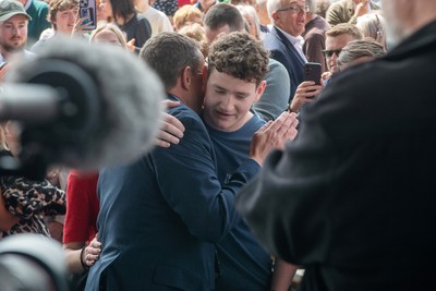 090526 - Picture shows Plaid Cymru leader Rhun Ap Lorwerth greeting supporters outside the Senedd in Cardiff, after winning the Welsh Election