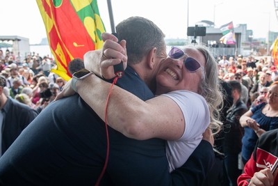 090526 - Picture shows Plaid Cymru leader Rhun Ap Lorwerth greeting supporters outside the Senedd in Cardiff, after winning the Welsh Election