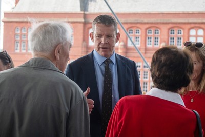 090526 - Picture shows Plaid Cymru leader Rhun Ap Lorwerth greeting supporters outside the Senedd in Cardiff, after winning the Welsh Election