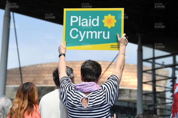 090526 - Picture shows Plaid Cymru supports outside the Senedd in Cardiff in support of Plaid Cymru winning the Welsh Election